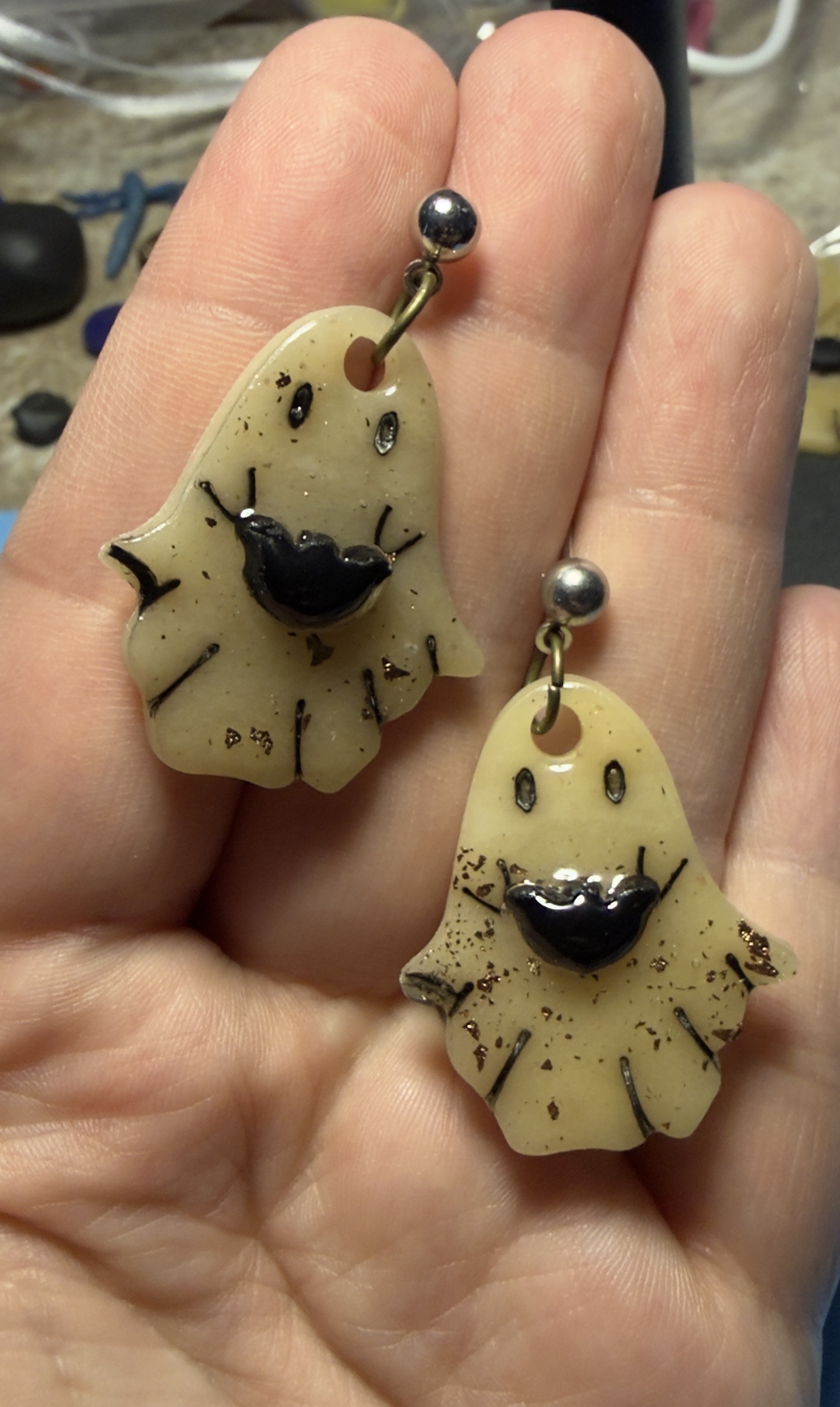 Ghosts holding bats
