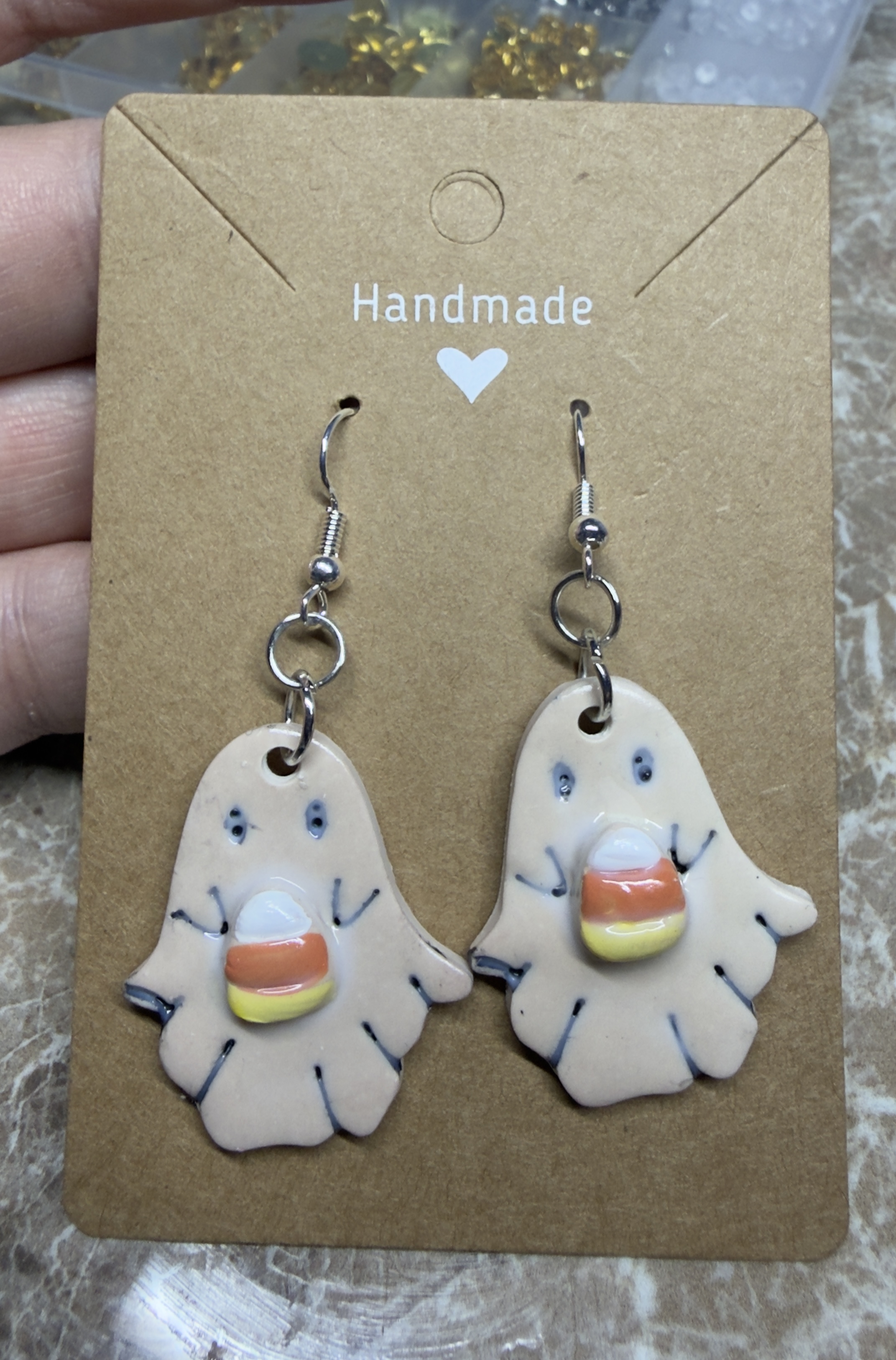 Ghost holding candy corn dangle
