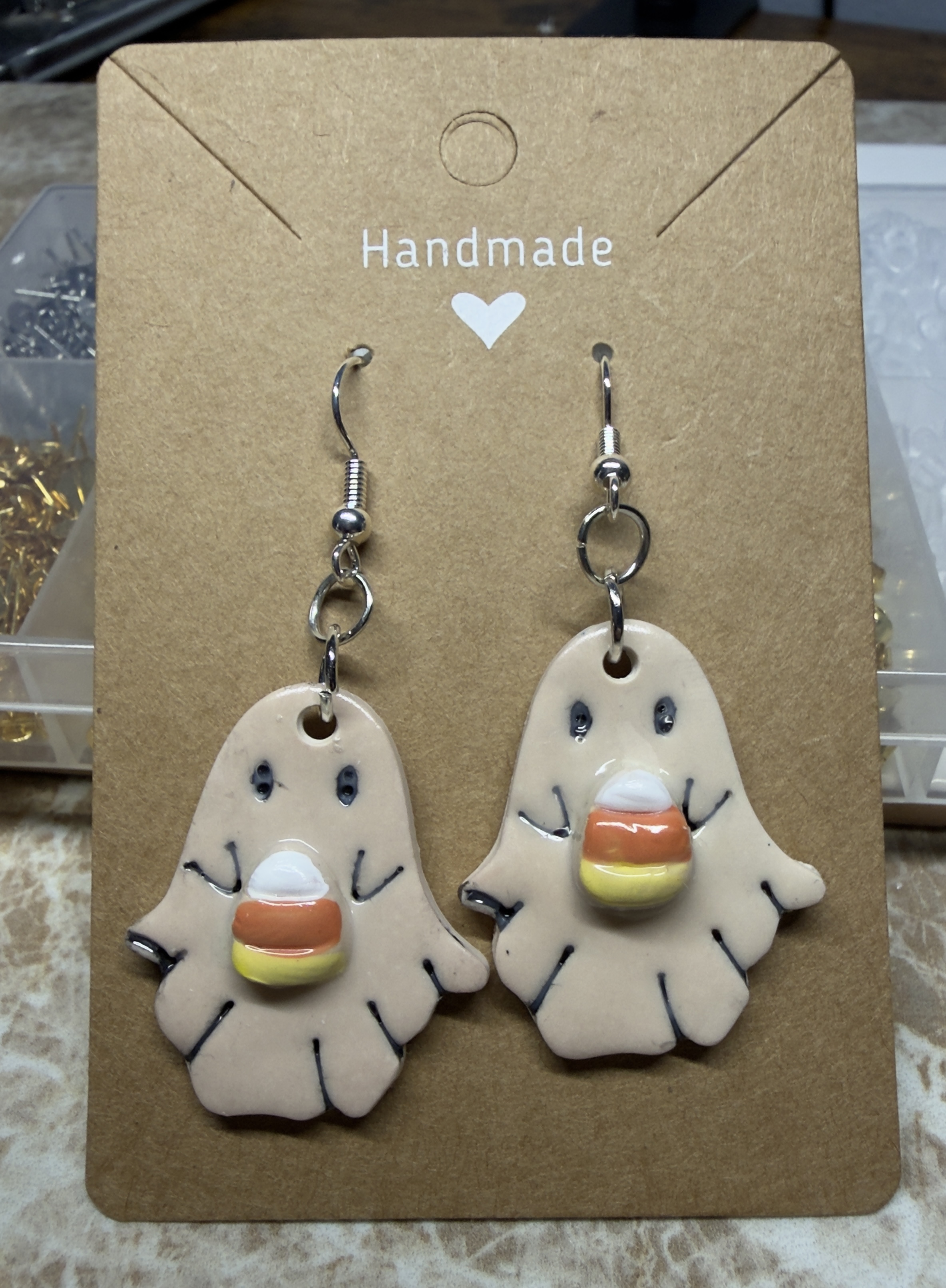 Ghost holding candy corn dangle